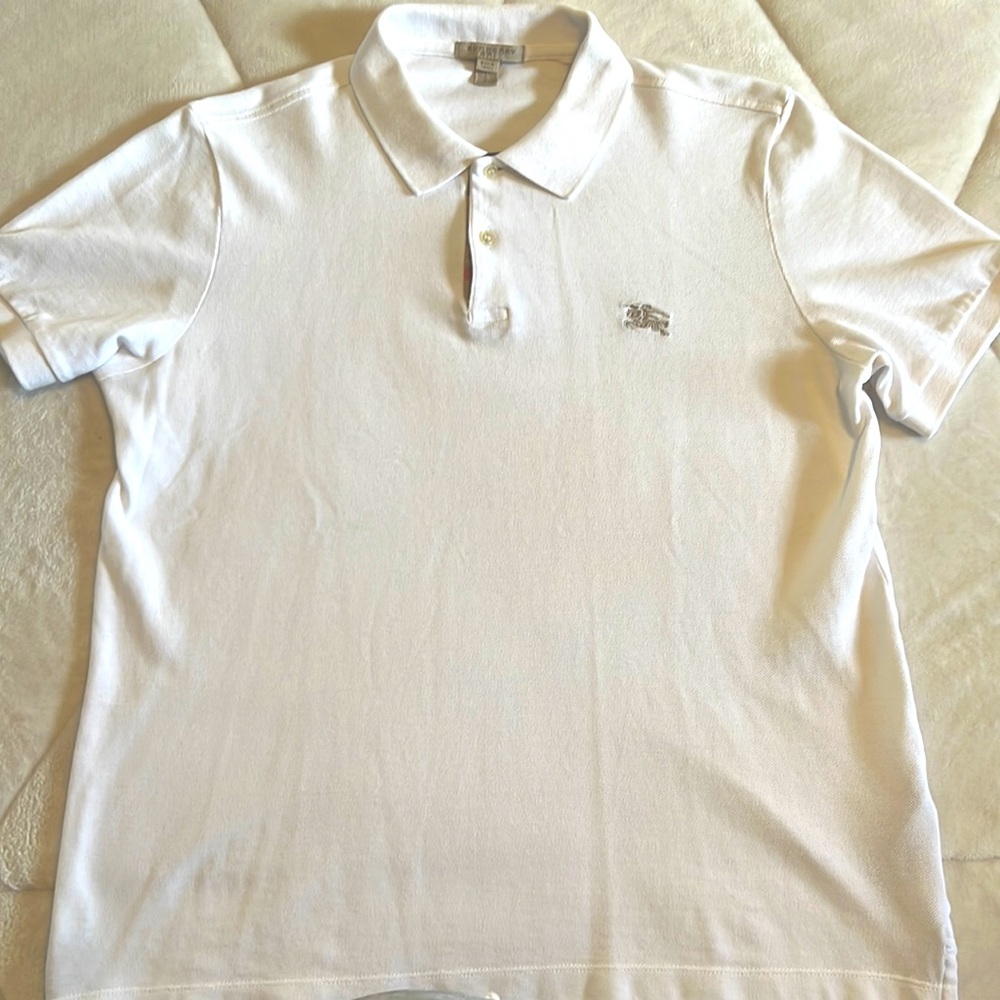 Burberry polo shirt.